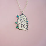 Hand-Carved Queen of Country Pendent