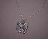 Hand-Carved Kissin’ Pendent