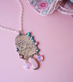 Hand-Carved Queen of Country Pendent