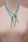 The Gold and Turquoise Beaded Bolo