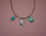 Hand-Carved Turquoise Pendent (18”)