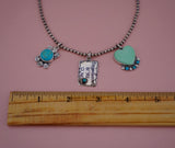 Hand-Carved Turquoise Pendent (18”)