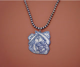 Hand-Carved Turquoise Pendent