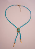 The Gold and Turquoise Beaded Bolo
