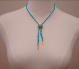 The Gold and Turquoise Beaded Bolo